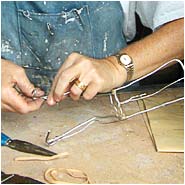 bending the armature to form a foot