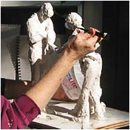 covering the armature with plaster